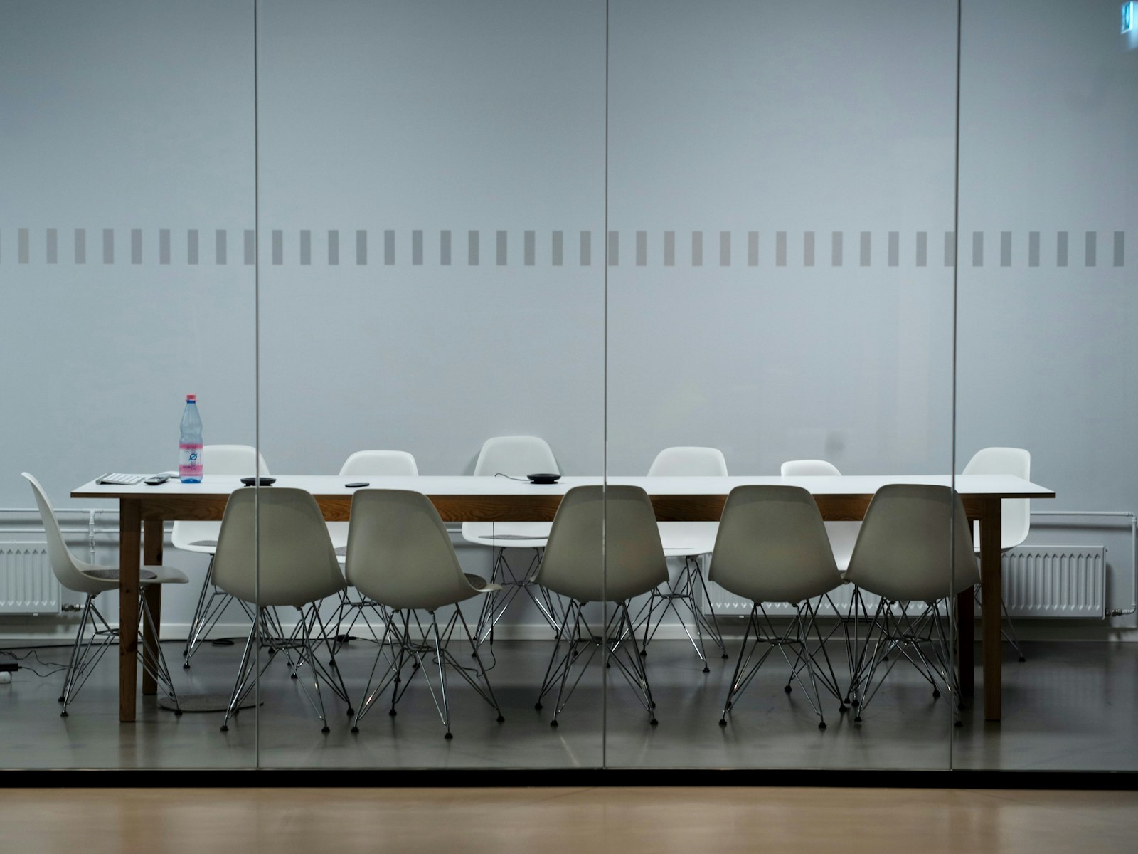 Empty office conference room with table and chairs