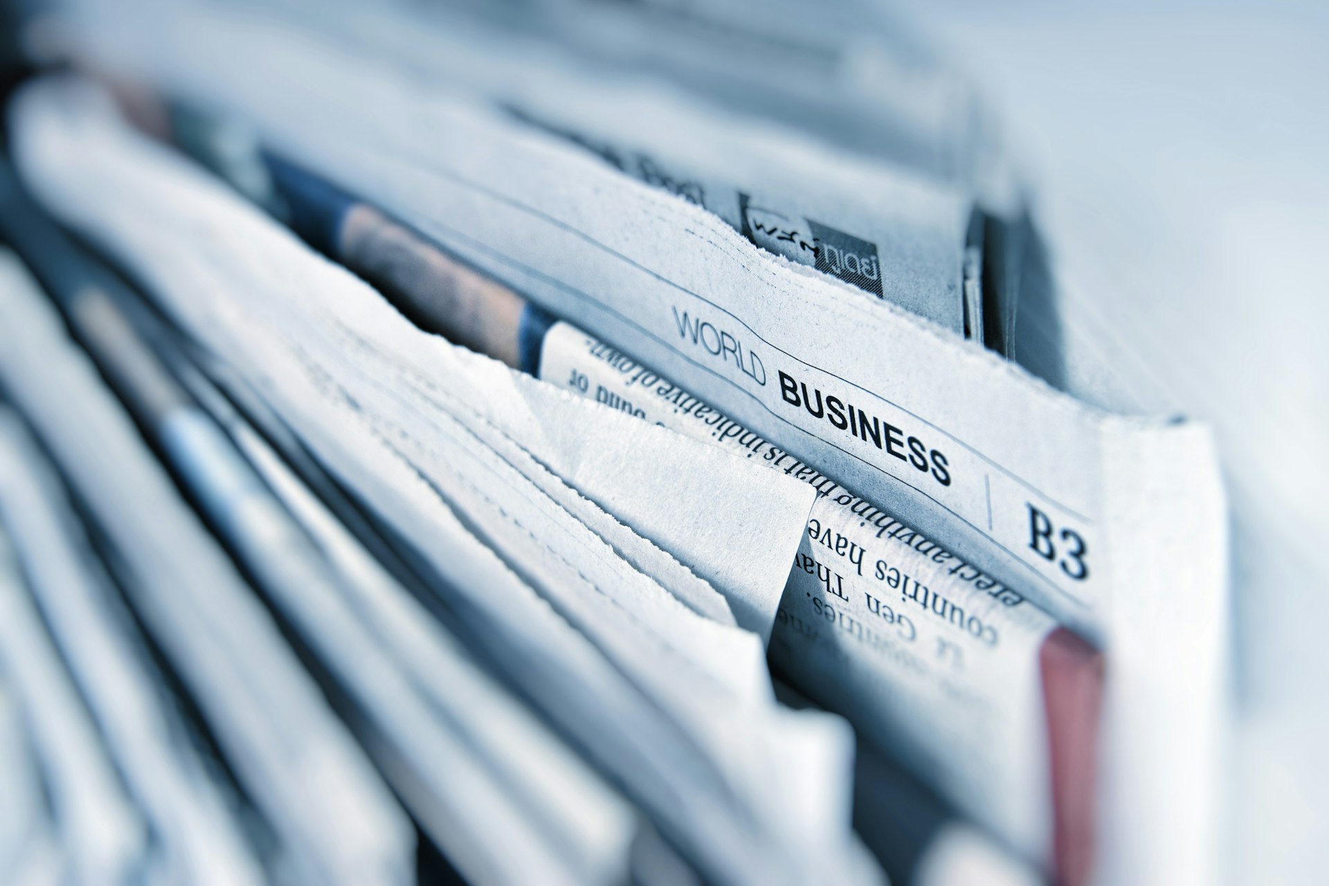 Newspapers and a writing desk